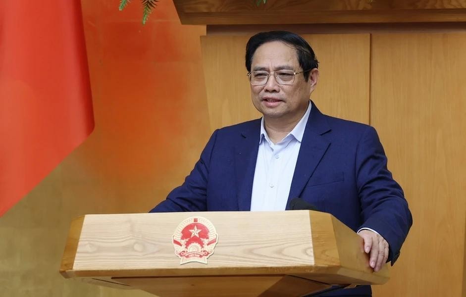 政府总理范明政在例会上发言。(图: 越通社)