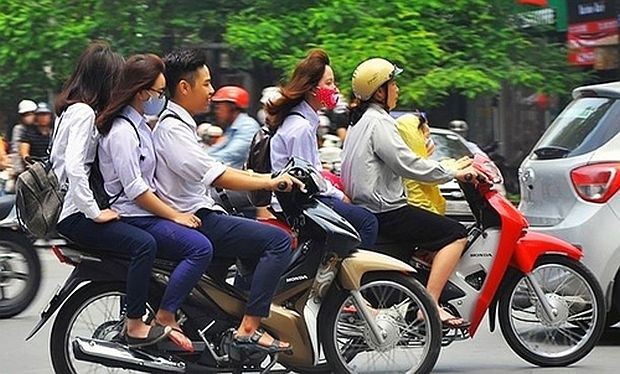 很多学生在参加交通时的安全意识不高。(图:庆薇)