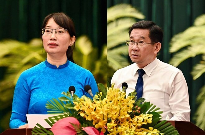 图为两位新任胡志明市人委会副主席陈氏妙翠(左)和杨玉海。(图:M.Minh)