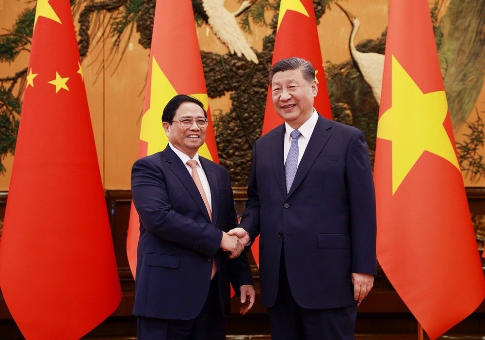 政府总理范明政会见中国总书记、国家主席习近平。(图:越通社)