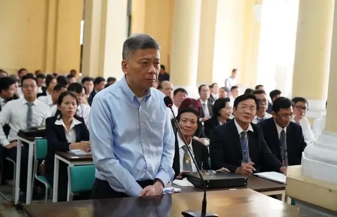 出庭受审张美兰与共犯案件第一阶段的被告人朱立基。(图:成钟)
