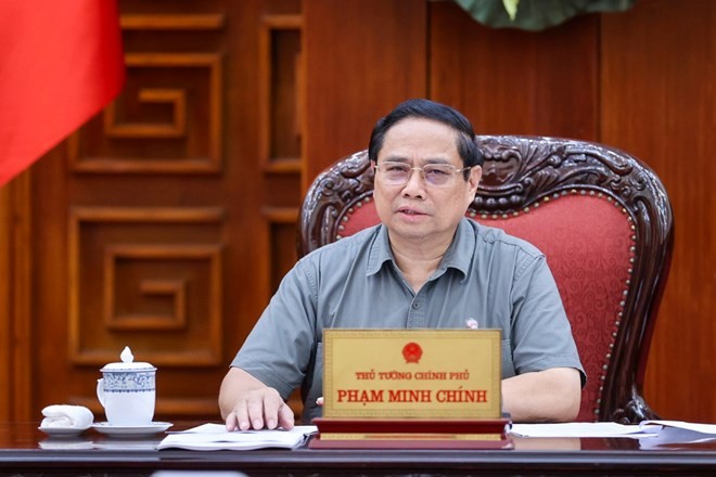 政府总理范明政主持会议。(图:日北)