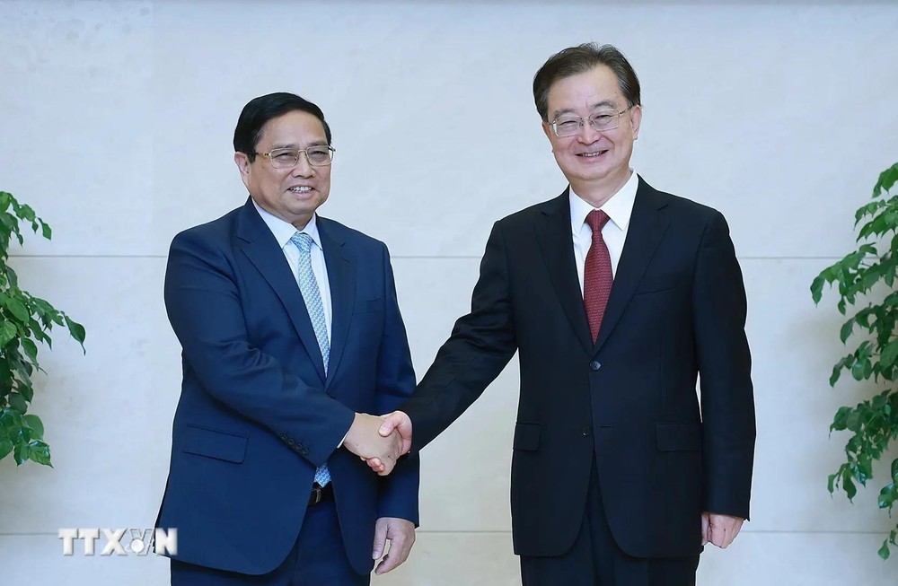 越南政府总理范明政会见中国云南省委书记王宁。(图:越通社) 越南政府总理范明政会见中国云南省委书记王宁。(图:越通社)