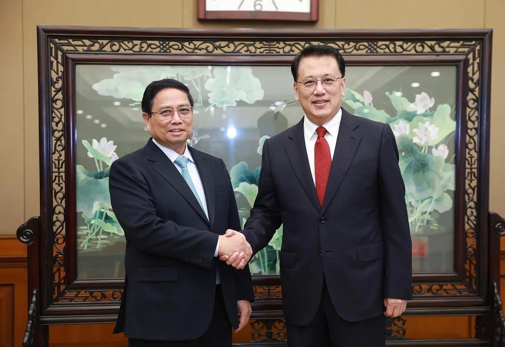 政府总理范明政会见中国重庆市委书记袁家军。(图:越通社) 政府总理范明政会见中国重庆市委书记袁家军。(图:越通社)