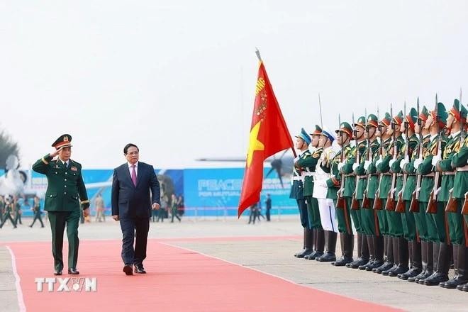 政府总理范明政出席2024年越南国际国防展。(图:越通社)