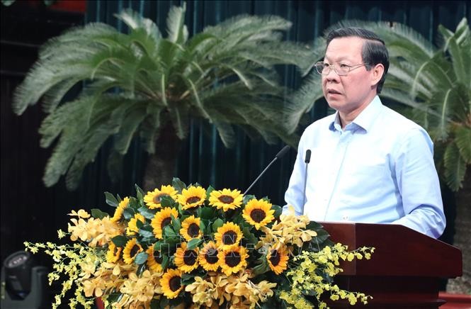 市人委会主席潘文迈会上发言。(图:越通社)