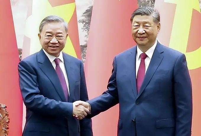 图为2024年8月访华，党中央总书记苏林与中国国家主席习近平会面。（图：越通社）