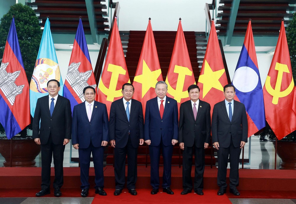 越南、老挝与柬埔寨三国国家领导合影。(图:越通社)