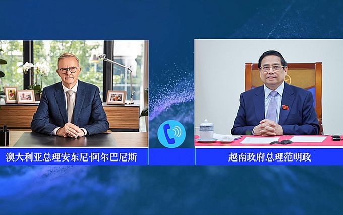 政府总理范明政（右）与澳大利亚总理安东尼‧阿尔巴尼斯举行电谈。