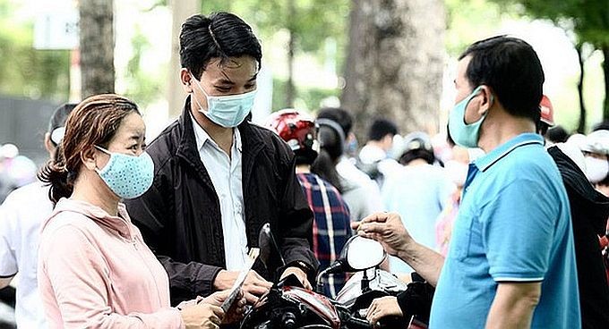 市卫生厅:公共场所应佩戴口罩。(示意图:互联网)