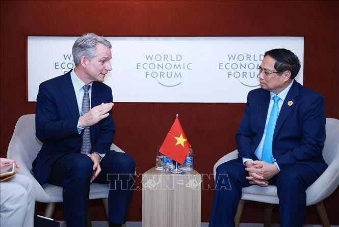 越南政府总理范明政会见德国西门子股份公司管理委员会成员、首席技术官和首席战略官彼得·科尔特。(图:越通社)