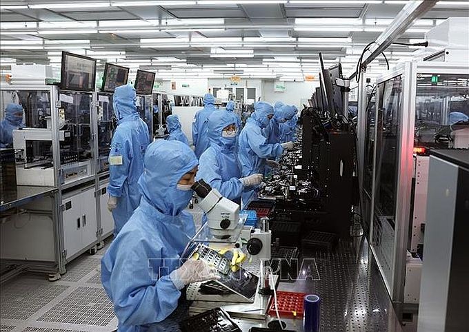 宁平省福山工业区的MCNEX VINA公司(韩国全资)生产电子零件厂一隅。