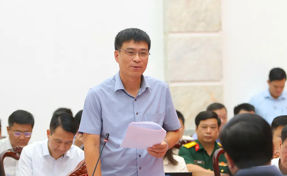 Thứ trưởng Bộ Xây dựng Phạm Minh Hà báo cáo tại hội nghị 9e5af1c31d079059c916.jpg