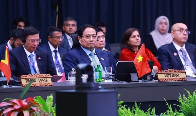 越南政府总理范明政出席第22届东盟-印度峰会。