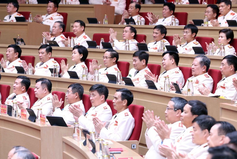 与会代表。图自越通社 