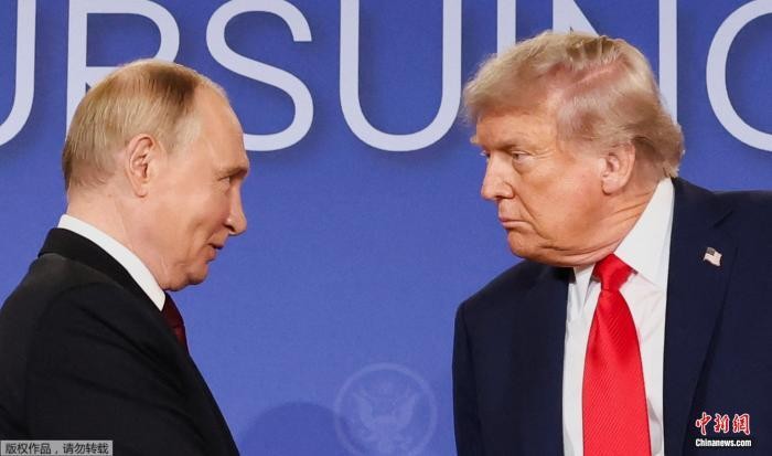 资料图：普京与特朗普。 