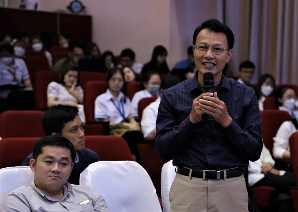 Chánh án Tòa án nhân dân Tối cao nói chuyện với sinh viên, giảng viên ĐH Quốc gia TPHCM ảnh 2