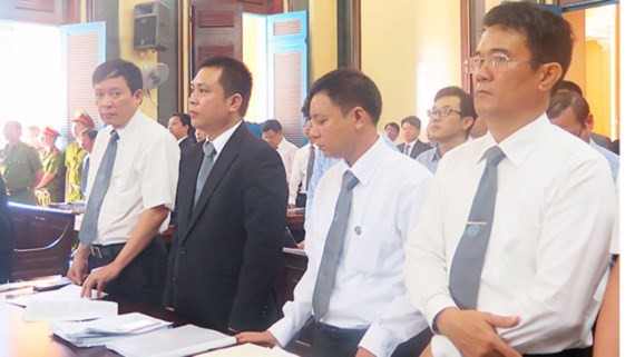 Lawyers participate in the proceedings at a court