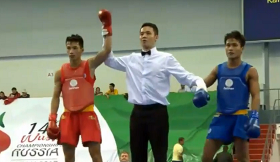 Vietnamese wushu fighter Vo Minh Duc  (in red) (Source: vothuat.vn)