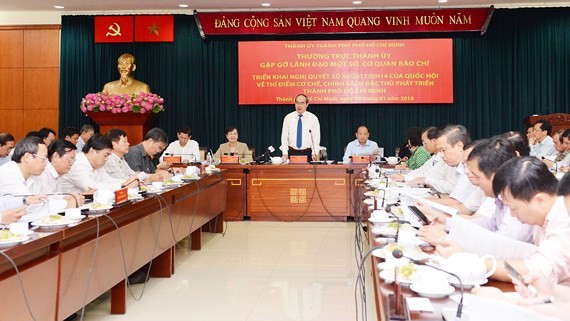 HCMC Party Chief Nguyen THien Nhan meets leaders of press agencies on January 9 (Photo: SGGP)