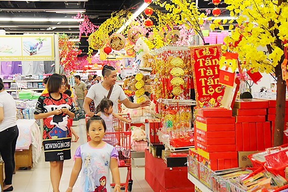 Supermarkets will increase opening time by 2-4 hours in days near the Tet holiday (Photo: SGGP)