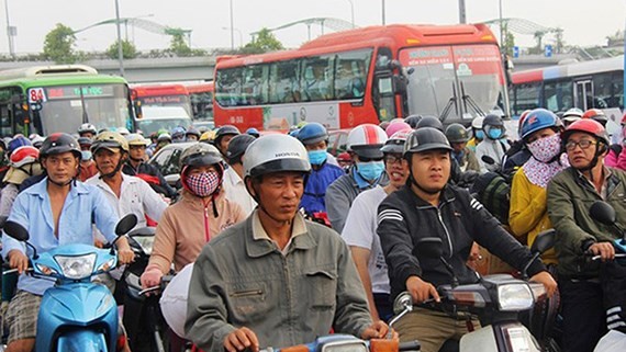 A traffic jam stretches over 10 kilometers in Highway N2, Bến Lức district, Long An province in the photo taken from Minh Hai's Facebook posting