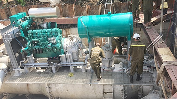 The pumping machine system in Nguyen Huu Canh street (Photo: SGGP)