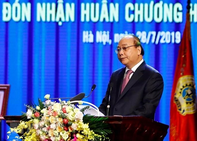 PM Nguyen Xuan Phuc speaks at the meeting. (Photo: VNA)