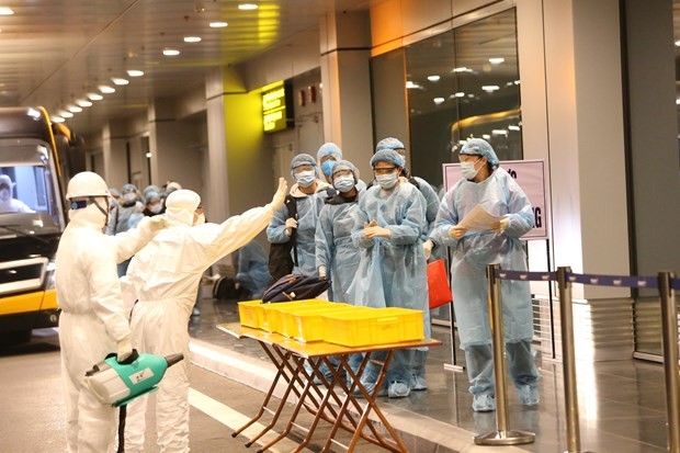 Vietnamese citizens at Quang Ninh's Van Don airport (Source: VNA)