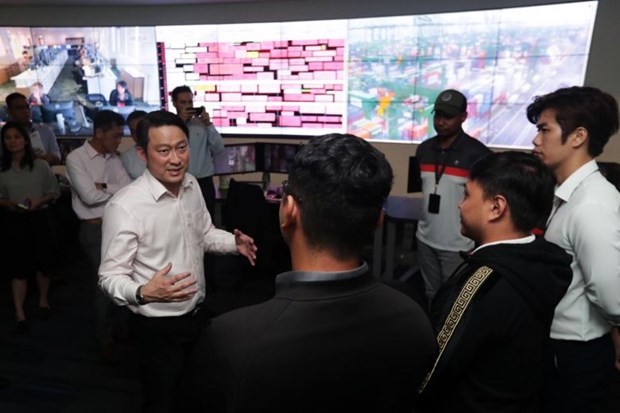 Singaporean Senior Minister of State for Transport and Health Lam Pin Min during a visit to PSA Singapore at Pasir Panjang Terminal Building 3 on February 12 (Photo: straitstimes.com)