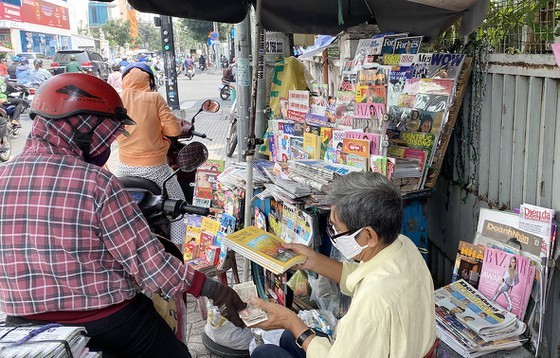 An old news-stand on the side of the road