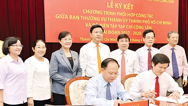 Lễ ký kết Chương trình phối hợp công tác giai đoạn 2017 - 2020. Ảnh: VIỆT DŨNG