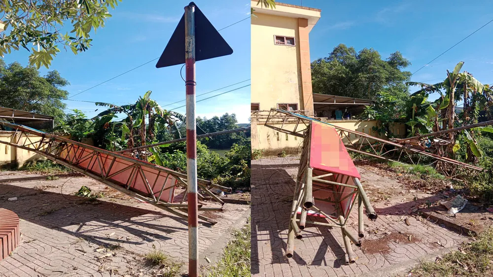 Một phần cổng chào đã được kéo khỏi hiện trường để đảm bảo an toàn giao thông aqq.jpg