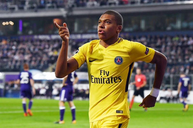 Niềm vui của Kylian Mbappe sau khi làm nên lịch sử ở Champions League. Ảnh: Getty Images 