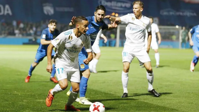 Real (trắng) có chiến thắng trước Fuenlabrada. Ảnh: Getty Images