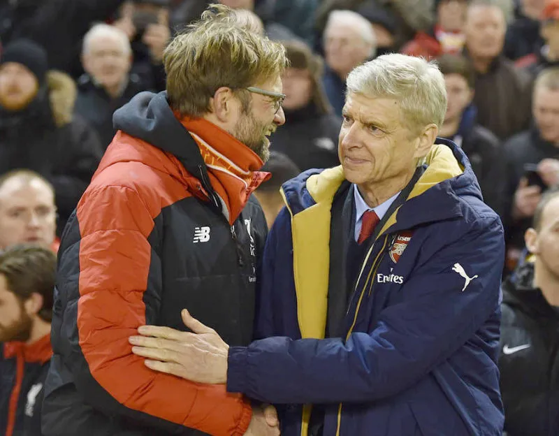 HLV Arsene Wenger (phải) liệu sẽ lần đầu giành điểm trước Jurgen Klopp? Ảnh: Getty Images
