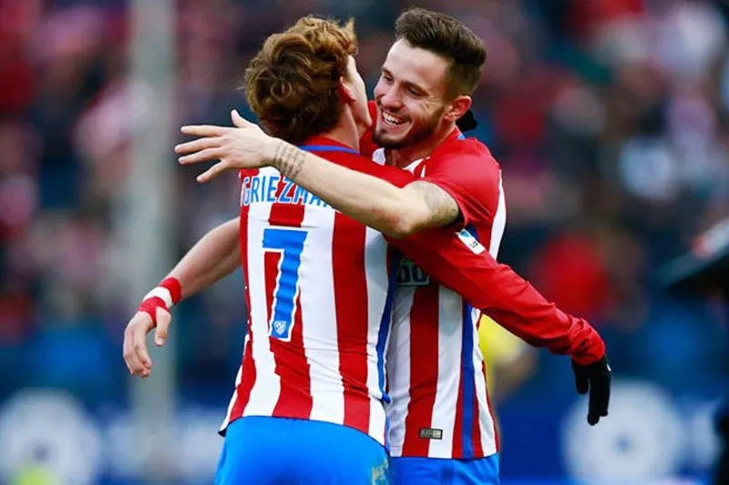 Barca muốn chiêu mộ Saul Niguez (phải) và Griezmann. Ảnh: Getty Images