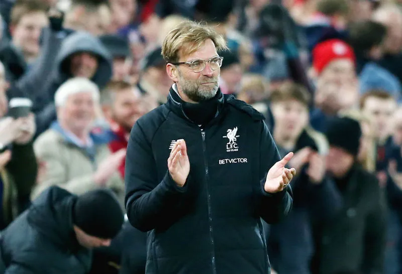 HLV Jurgen Klopp giờ đã kiệm lời hơn khi đã “hòa nhập” với Premier League. Ảnh: Getty Images