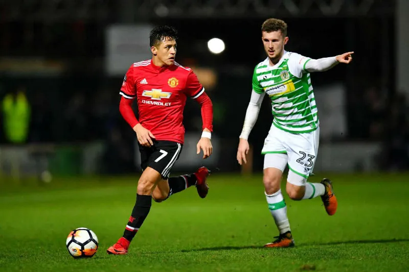 Alexis Sanchez (trái) đã có màn ra mắt ấn tượng cùng Man.United. Ảnh: Getty Images