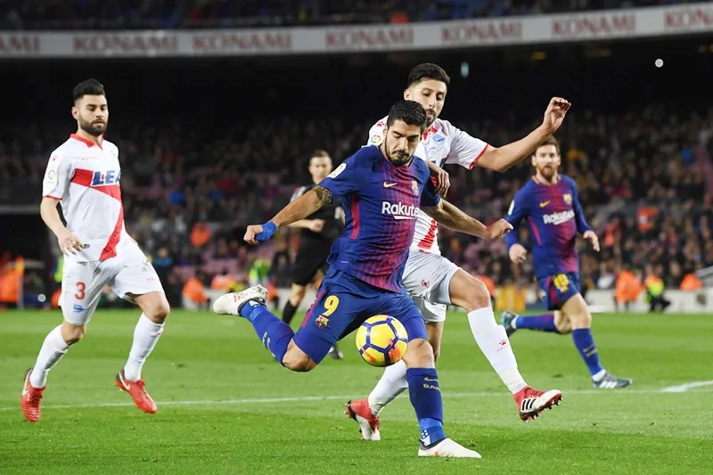 Suarez ghi bàn giúp Barca có 3 điểm.Ảnh: Getty Images