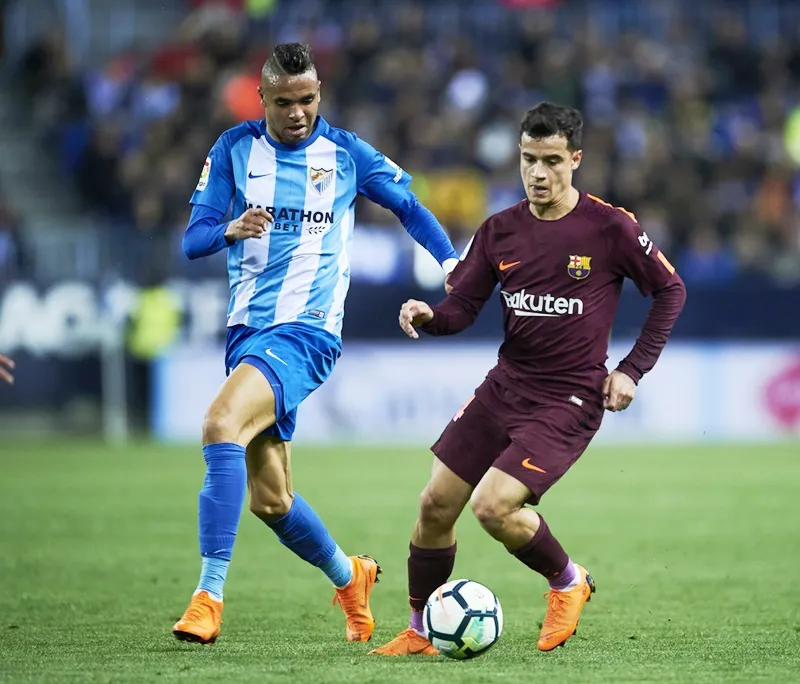 Coutinho (phải) ghi bàn giúp Barca chiến thắng trong ngày vắng Messi. Ảnh: Getty Images.