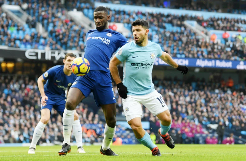 Antonio Rudiger (trái) từng hóa giải chân sút hàng đầu Sergio Aguero (Man.City). Ảnh: Getty Images 