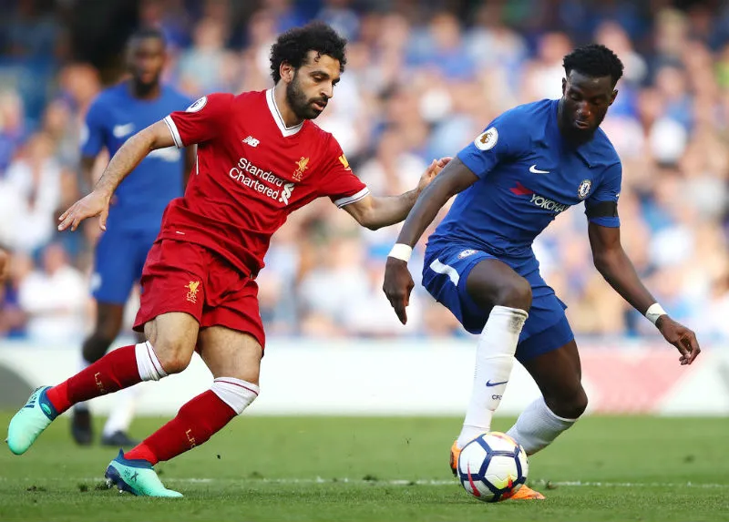 Mohamed Salah (trái) và Liverpool vẫn còn cơ hội tự quyết suất dự Champions League mùa tới. Ảnh: Getty Images