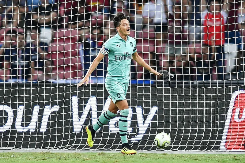 Mesut Oezil mừng bàn mở tỷ số. Ảnh: Getty Images