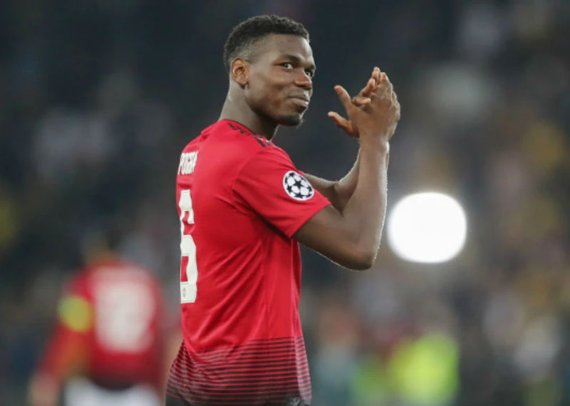 Paul Pogba và cả Barca đều đang chờ quyết định của Man.United. Ảnh: Getty Images 