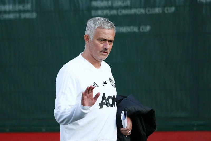 HLV Jose Mourinho khẳng định quyết tâm ở lại Man.United. Ảnh: Getty Images 