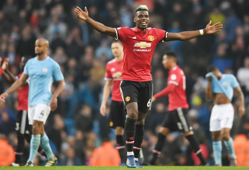 Paul Pogba mừng chiến thắng ở mùa qua, nhưng anh có nguy cơ là mất mát lớn của Man.United vào Chủ nhật này. Ảnh: Getty Images