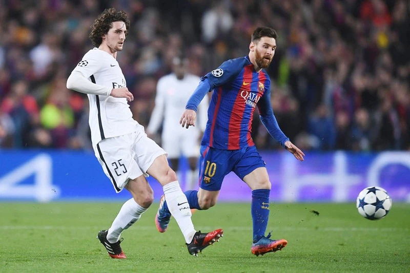 Adrien Rabiot (trái) sẽ là động đội của Lionel Messi mùa tới? Ảnh: Getty Images 