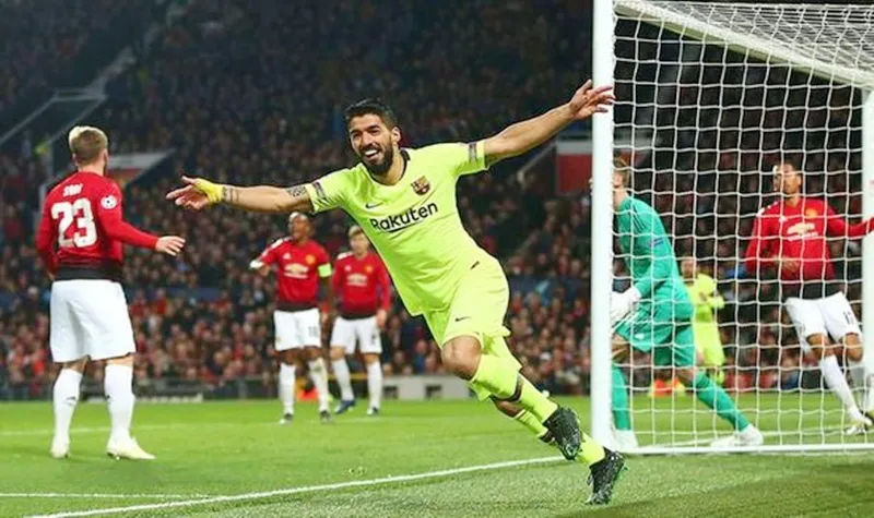 Luis Suarez mừng bàn thắng tạo lợi thế lớn cho Barca. Ảnh: Getty Images