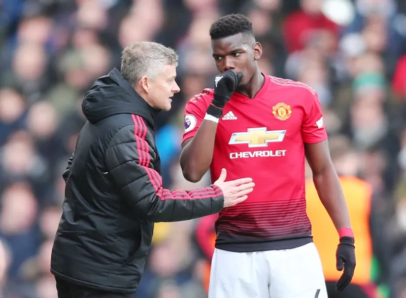HLV Ole Gunnar Solskjaer hy vọng thuyết phục Paul Pogba ở lại thêm một mùa. Ảnh: Getty Images